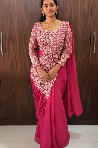Pink georgette embroidered saree with beads