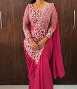 Pink georgette embroidered saree with beads