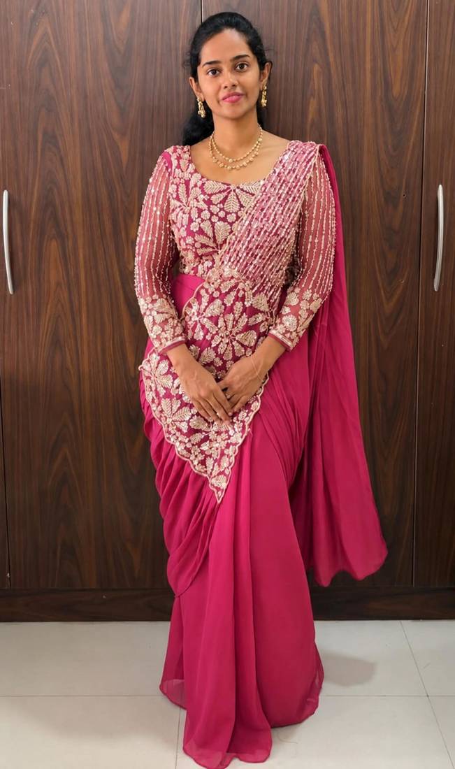 Pink georgette embroidered saree with beads