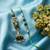 set of 2 green artificial beads traditional bhaiya bhabhi rakhi with roli chawal