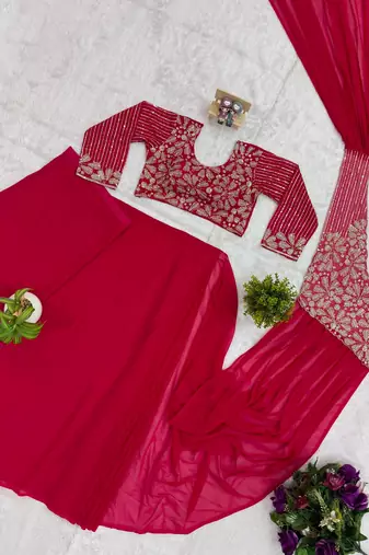 Pink georgette embroidered saree with beads