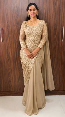 Beige georgette embroidered saree with beads 1