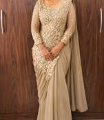 Beige georgette embroidered saree with beads