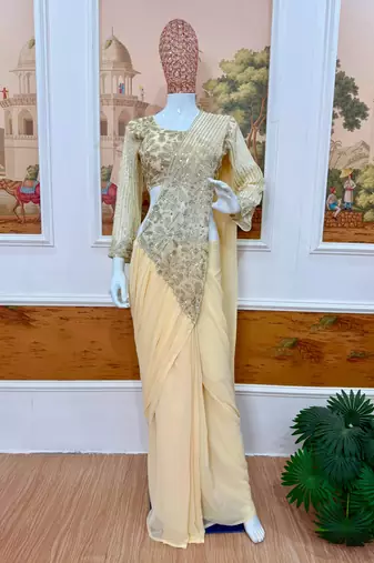 Beige georgette embroidered saree with beads