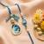 set of 2 blue evil eye traditional gold toned bhaiya bhabhi rakhi with roli chawal