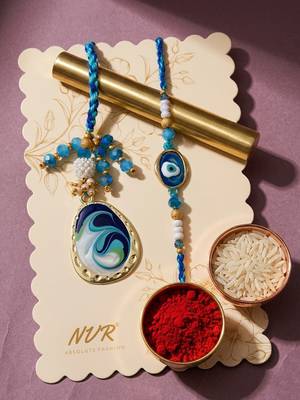 set of 2 blue evil eye traditional gold toned bhaiya bhabhi rakhi with roli chawal 2