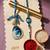 set of 2 blue evil eye traditional gold toned bhaiya bhabhi rakhi with roli chawal