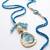 set of 2 blue evil eye traditional gold toned bhaiya bhabhi rakhi with roli chawal
