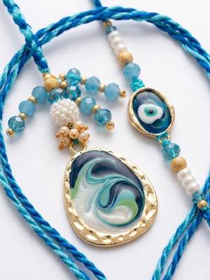 set of 2 blue evil eye traditional gold toned bhaiya bhabhi rakhi with roli chawal 4