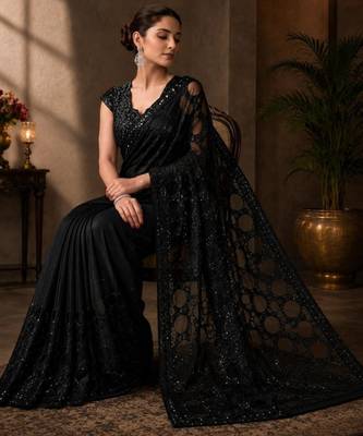 Black net embroidered saree with sequins work 4