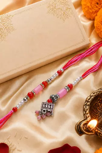 set of 2 artificial beads jhumka design bhaiya bhabhi rakhi with roli chawal