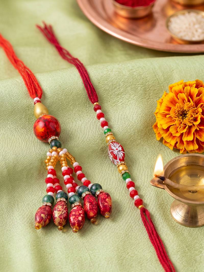 set of 2 designer red artificial beads bhaiya bhabhi rakhi with roli chawal chandan