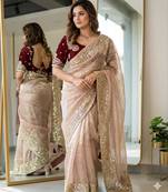 Beige silk blend embroidered saree with sequins work