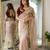 Beige silk blend embroidered saree with sequins work