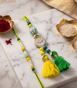 set of 2 green & yellow beaded heart shape bhaiya bhabhi rakhi with roli chawal