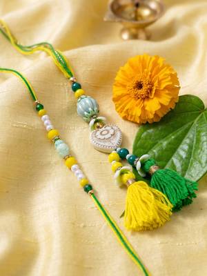 set of 2 green & yellow beaded heart shape bhaiya bhabhi rakhi with roli chawal 2