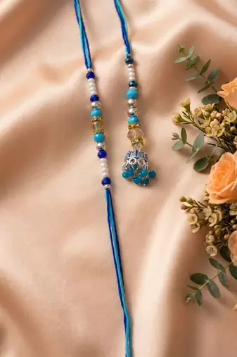 set of 2 blue artificial beads jhumka design bhaiya bhabhi rakhi with roli chawal