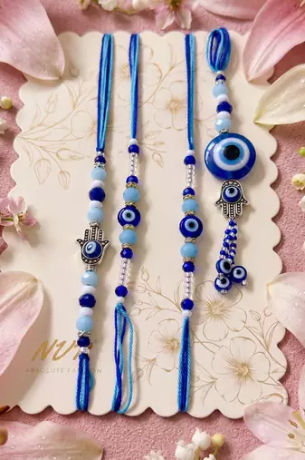 set of 4 designer blue evil eye thread rakhi with roli chawal chandan mishri