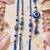 set of 4 designer blue evil eye thread rakhi with roli chawal chandan mishri