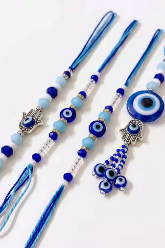set of 4 designer blue evil eye thread rakhi with roli chawal chandan mishri