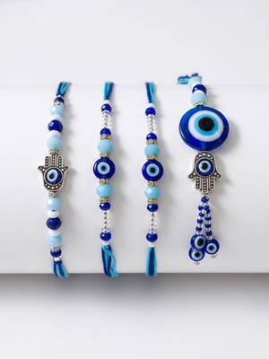 set of 4 designer blue evil eye thread rakhi with roli chawal chandan mishri 4