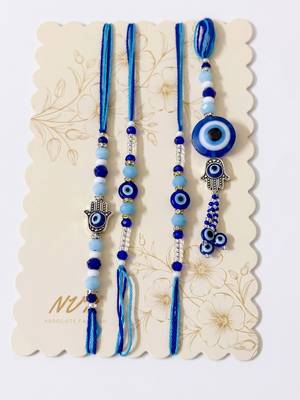 set of 4 designer blue evil eye thread rakhi with roli chawal chandan mishri 5