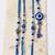 set of 4 designer blue evil eye thread rakhi with roli chawal chandan mishri