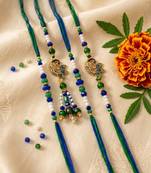 set of 4 green peacock design artificial beads thread rakhi with roli chawal