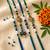 set of 4 green peacock design artificial beads thread rakhi with roli chawal