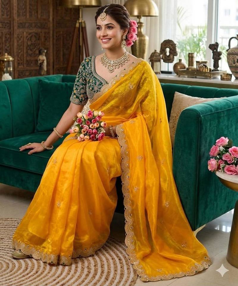Yellow silk blend embroidered saree with sequins work