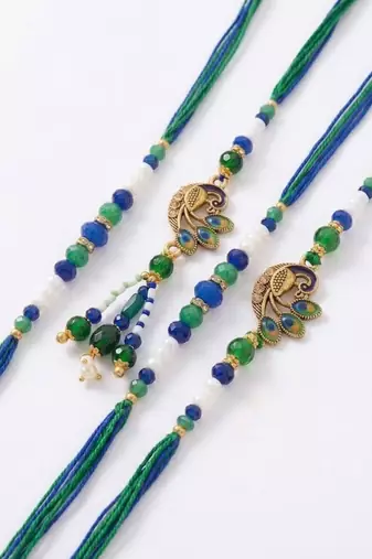 set of 4 green peacock design artificial beads thread rakhi with roli chawal