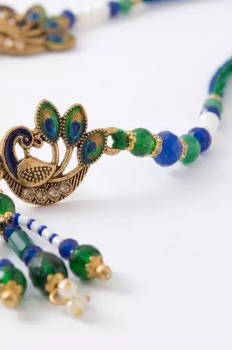 set of 4 green peacock design artificial beads thread rakhi with roli chawal