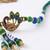 set of 4 green peacock design artificial beads thread rakhi with roli chawal