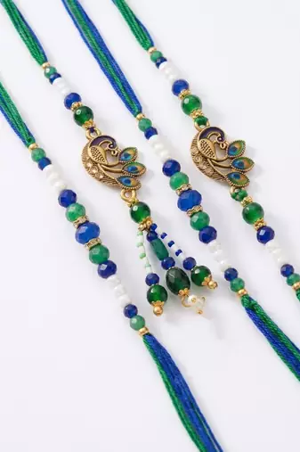 set of 4 green peacock design artificial beads thread rakhi with roli chawal