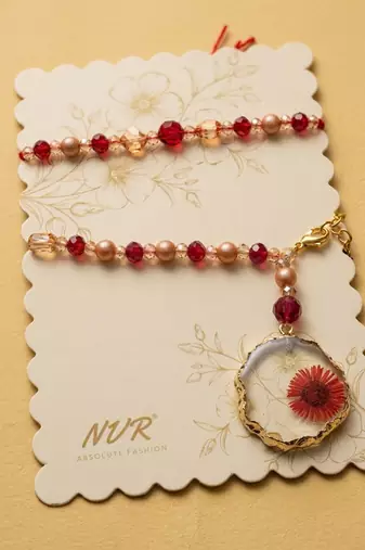 set of 2 gold toned red artificial beads bhaiya bhabhi rakhi with roli chawal chandan
