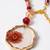set of 2 gold toned red artificial beads bhaiya bhabhi rakhi with roli chawal chandan