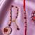 set of 2 gold toned red artificial beads bhaiya bhabhi rakhi with roli chawal chandan