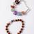 set of 2 rudraksh & seven chakra chip bracelet rakhi with roli chawal chandan mishri