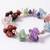 set of 2 rudraksh & seven chakra chip bracelet rakhi with roli chawal chandan mishri
