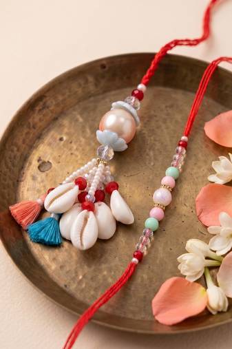 set of 2 multicolor artificial beads & sea shell bhaiya bhabhi rakhi with roli chawal