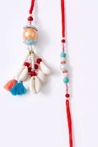 set of 2 multicolor artificial beads & sea shell bhaiya bhabhi rakhi with roli chawal