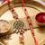 set of 2 gold toned artificial stones & beads bhaiya bhabhi rakhi with roli chawal