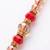 set of 2 gold toned artificial stones & beads bhaiya bhabhi rakhi with roli chawal