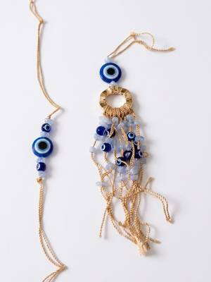 set of 2 gold toned round evil eye bhaiya bhabhi rakhi with roli chawal chandan mishri 3