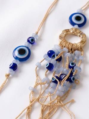 set of 2 gold toned round evil eye bhaiya bhabhi rakhi with roli chawal chandan mishri 4