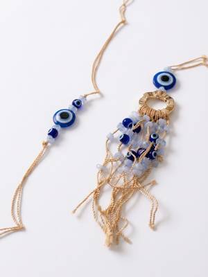set of 2 gold toned round evil eye bhaiya bhabhi rakhi with roli chawal chandan mishri 5
