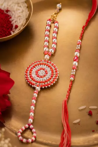 set of 2 gold toned pearls & beads round shape bhaiya bhabhi rakhi with roli chawal