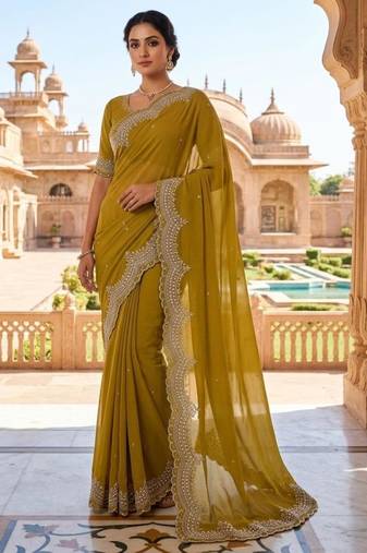 teal georgette embroidered saree with thread work