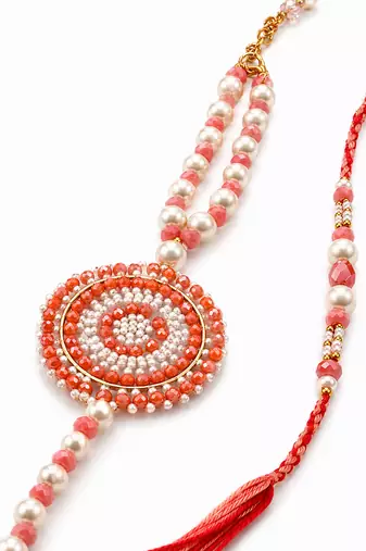 set of 2 gold toned pearls & beads round shape bhaiya bhabhi rakhi with roli chawal