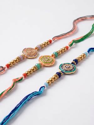 set of 3 floral design multicolor artificial beads thread rakhi with roli chawal 3